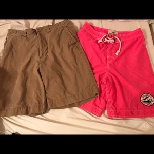 Hollister swim trunks and red camel 32 shorts.